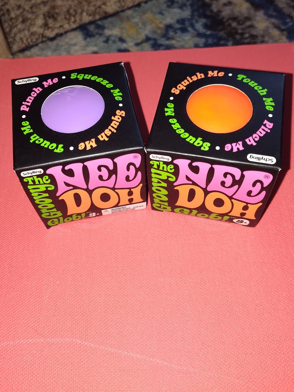 2 Nee Doh Groovy Glob Squeeze Balls - Purple & Orange